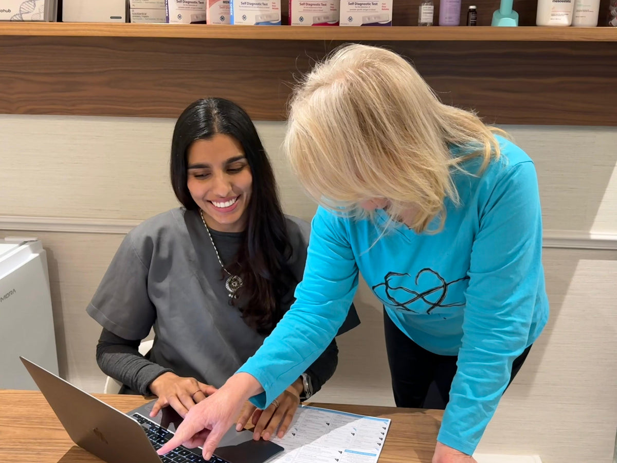 Doctor discussing a personalised peptide strategy with a patient